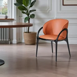 Chaise en cuir terracotta dos rond accoudoirs bois noir ALDER