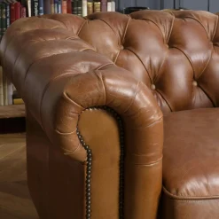 Fauteuil cuir brun Chesterfield 2 roulettes PRESTON
