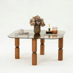 Table basse carrée en verre fumé - pieds bois marron sculpté BOMA