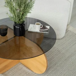 Table basse en verre fumé – pied en croix bois clair ANZIO