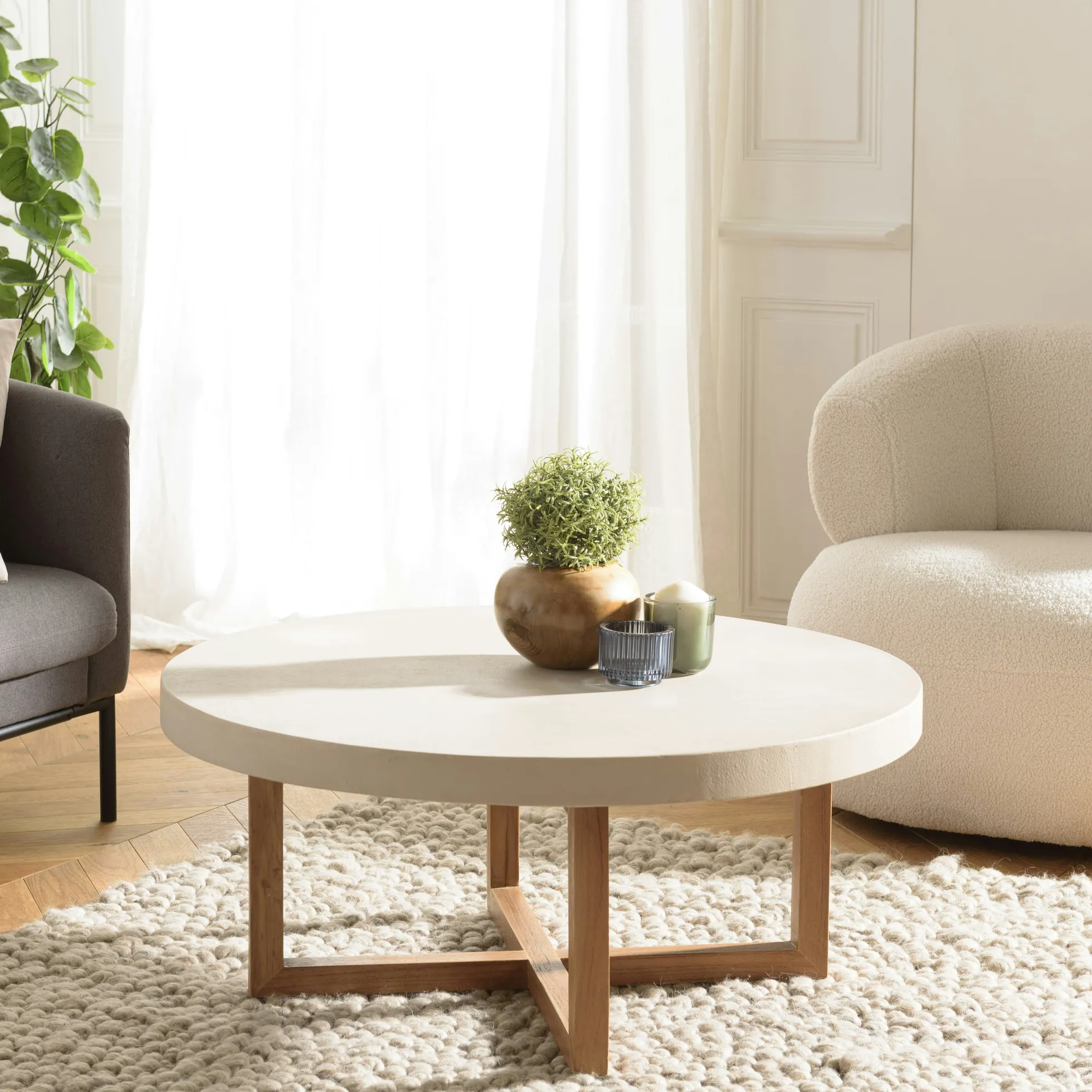 Table basse ronde béton beige pieds bois croisés DIKA