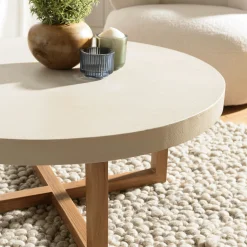 Table basse ronde béton beige pieds bois croisés DIKA