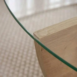 Table basse ronde en verre pied croisé effet bois SALTA