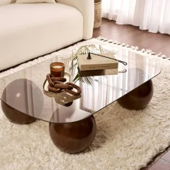 Table basse verre ambré bords arrondis 4 pieds boule KOCHI