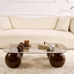 Table basse verre ambré bords arrondis 4 pieds boule KOCHI