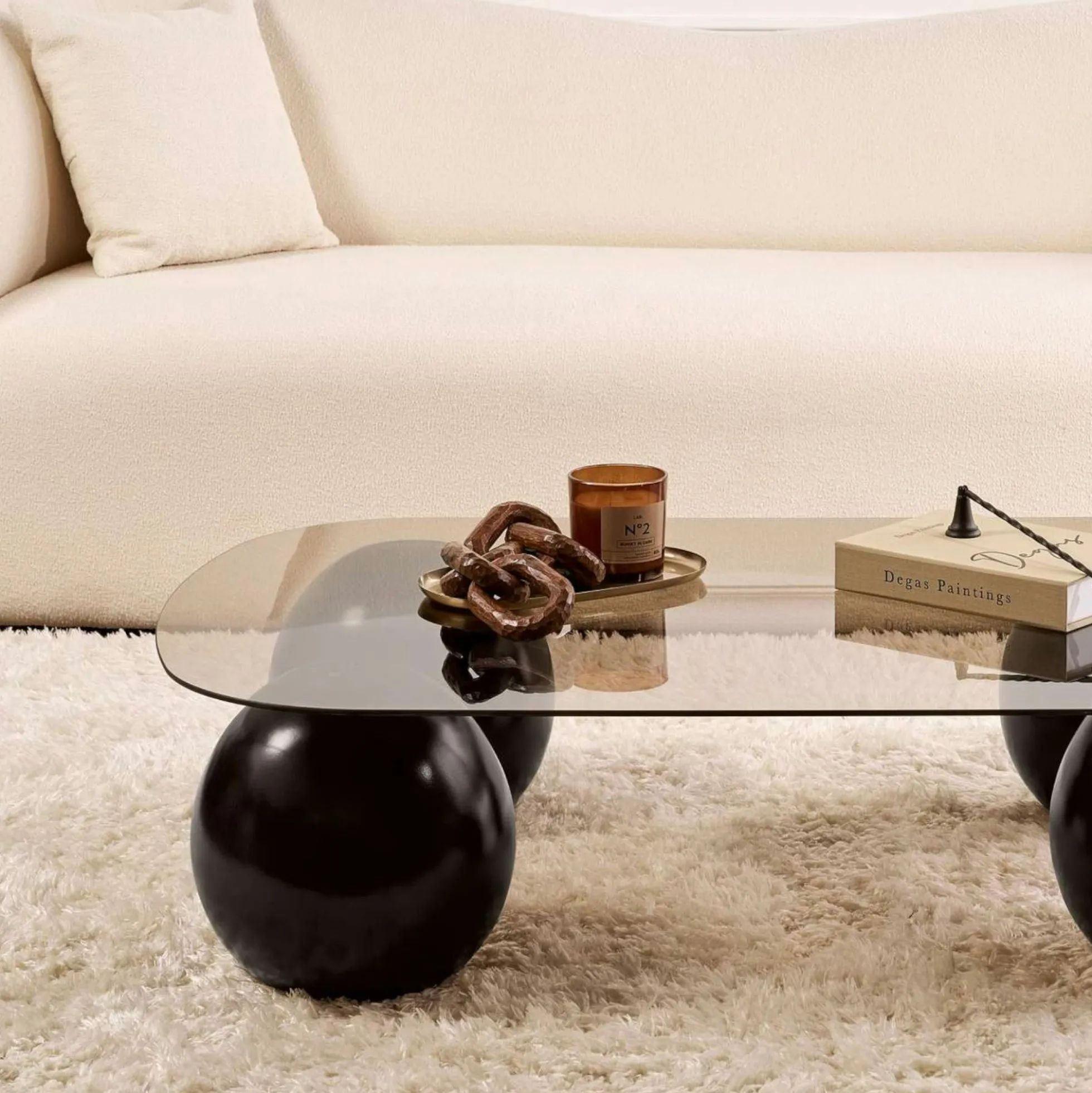 Table basse verre ambré bords arrondis - 4 pieds noirs KOCHI