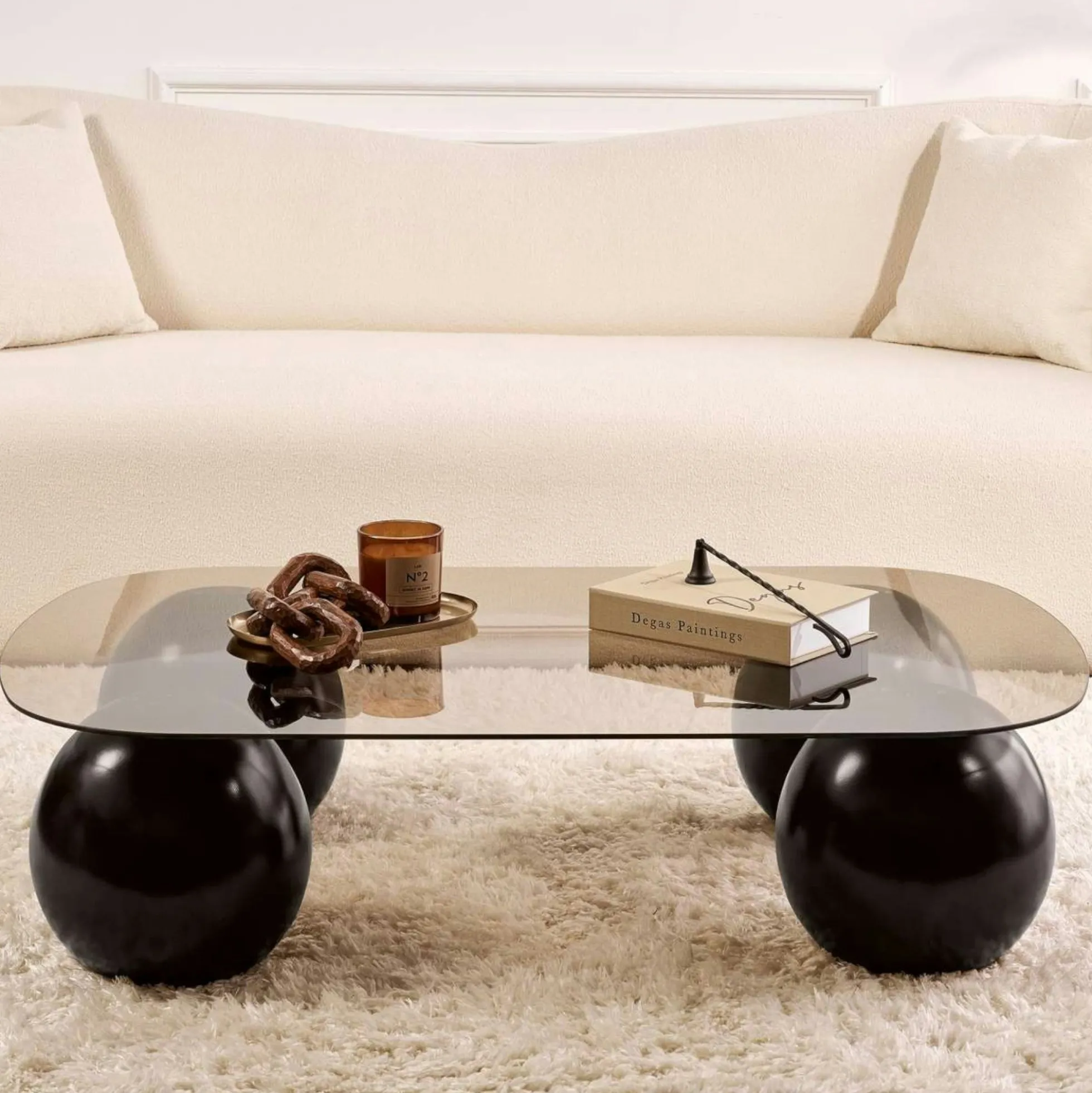 Table basse verre ambré bords arrondis - 4 pieds noirs KOCHI