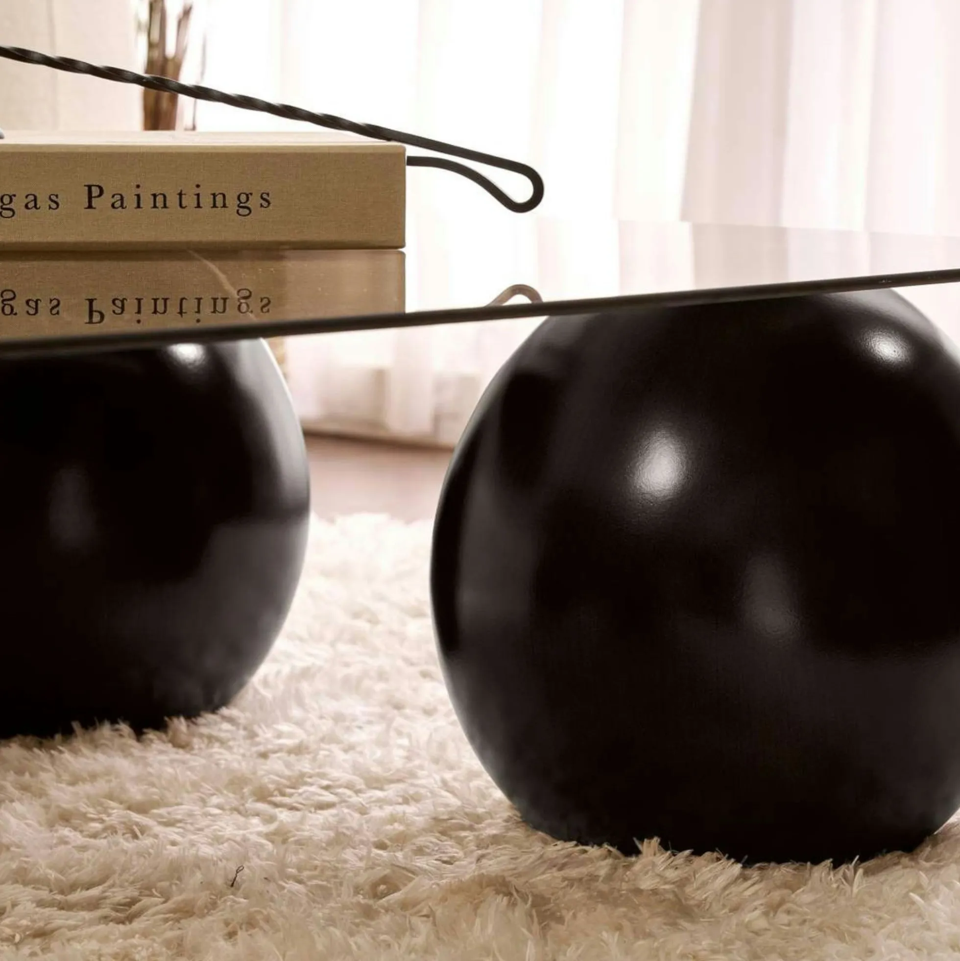 Table basse verre ambré bords arrondis - 4 pieds noirs KOCHI