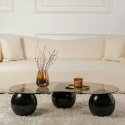 Table basse verre ambré design - 3 pieds boules noirs KOCHI