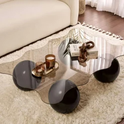 Table basse verre ambré profil ondulé - 4 pieds noirs KOCHI