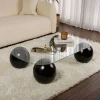 Table basse verre bords arrondis - 4 pieds boules noirs KOCHI