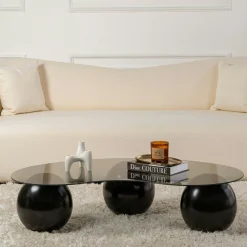 Table basse verre fumé design - 3 pieds boules noirs KOCHI