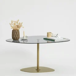 Table basse verre fumé minimaliste, galet et pied doré TULUM