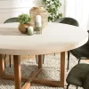 Table à manger ronde béton beige pieds bois croisés DIKA