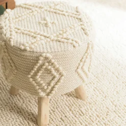 Tabouret rond laine ivoire avec losanges TIM