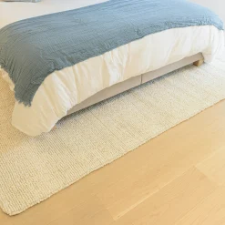 Tapis rectangulaire 160 x 230 cm laine bouclée ivoire