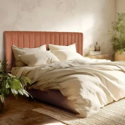 Tête de lit rembourrée pour lits 160/180cm velours orange RIVANA